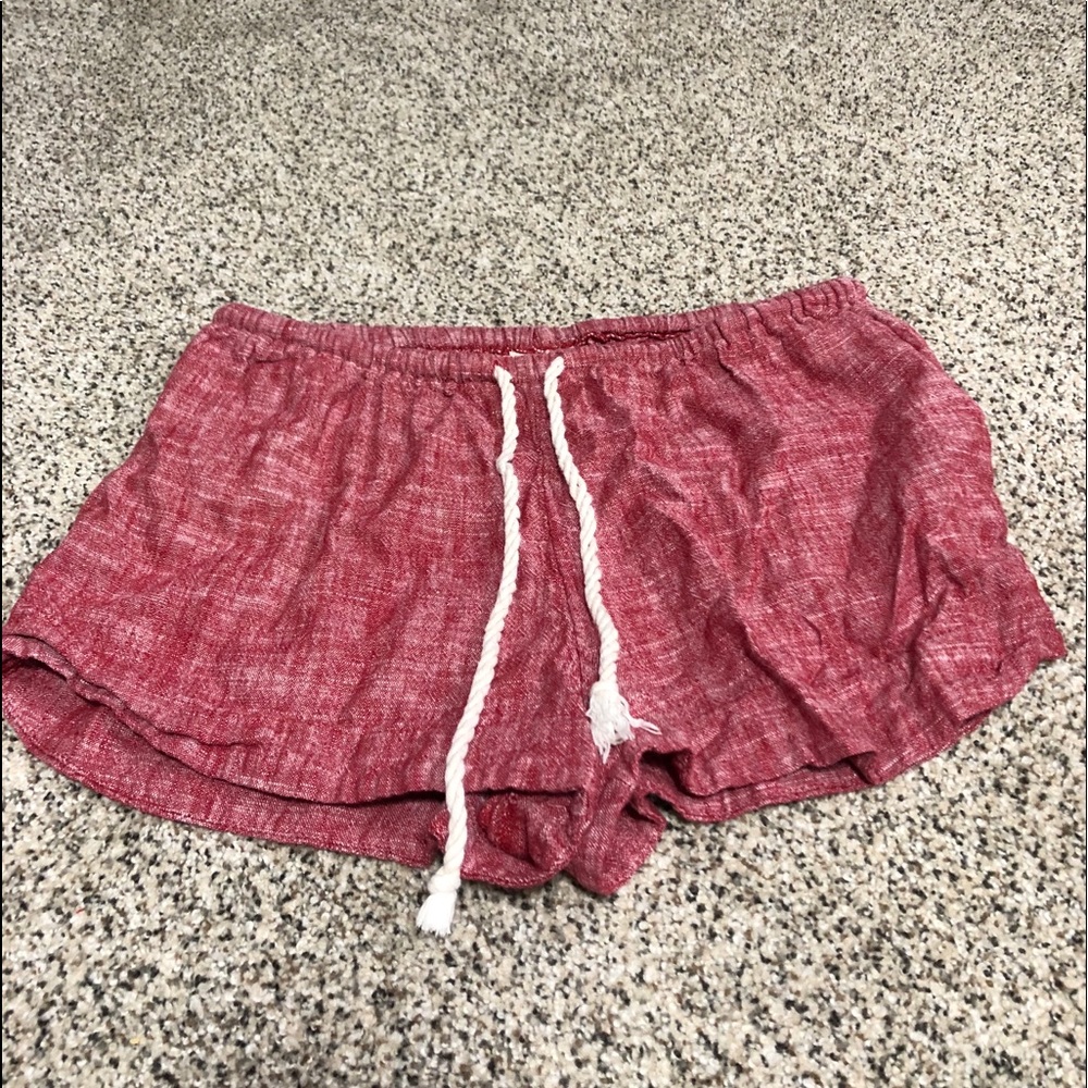 Faded red shorts